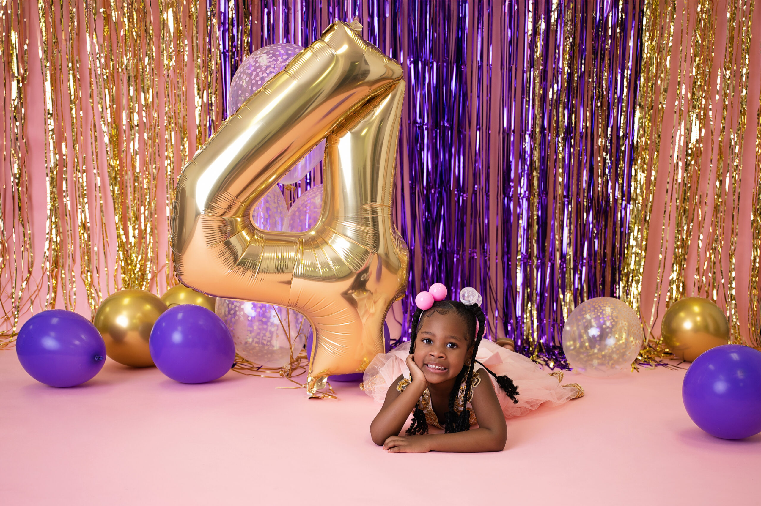 Leilani with her number 4 balloon during her birthday photoshoot in copperfield